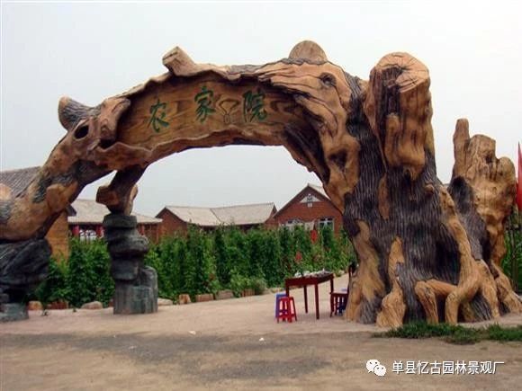 水泥景觀假樹大門制作,水泥假山假樹組合大門施工
