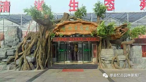 仿木假樹大門景觀安裝,水泥景觀假樹大門現(xiàn)場施工