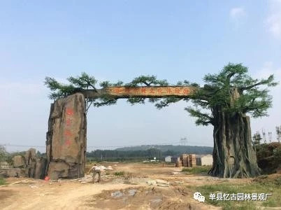 焦作市假樹大門設(shè)計商,焦作簡易水泥假樹大門施工