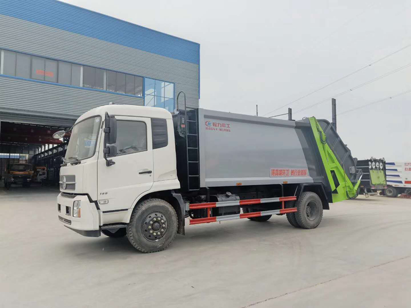 天锦12吨东风垃圾压缩车价格_挂桶压缩式垃圾车