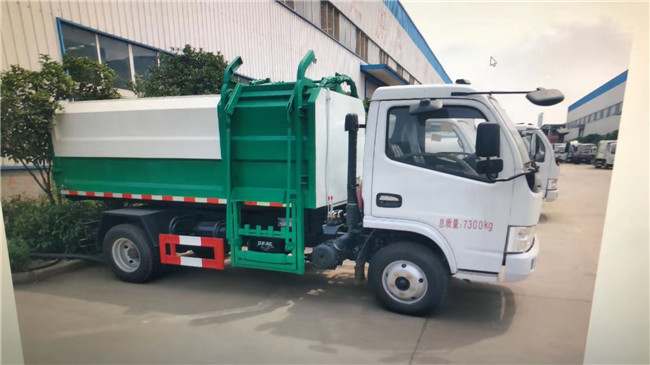 東風(fēng)多利卡掛桶帶壓縮式垃圾車.jpg