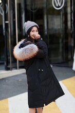 广州羽绒服女装货源,西树影黛羽绒服折扣批发低价走份图片
