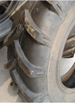 供应玉米脱粒机轮胎14.9-24三包人字轮胎可配内胎钢圈