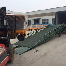 山西忻州市仓储货站高效率卸货台启运液压式登车桥集装箱机械定制图片