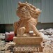 石雕麒麟的寓意晚霞红镇宅麒麟貔貅动物雕塑厂家