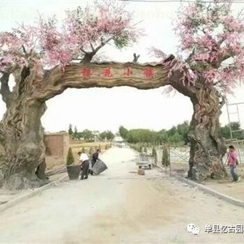 江蘇興化假樹(shù)大門制作水泥假樹(shù)大門施工廠家仿木假樹(shù)大門造價(jià)