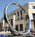 廣東別墅區不銹鋼圓擺件大型鏡面指環雕塑