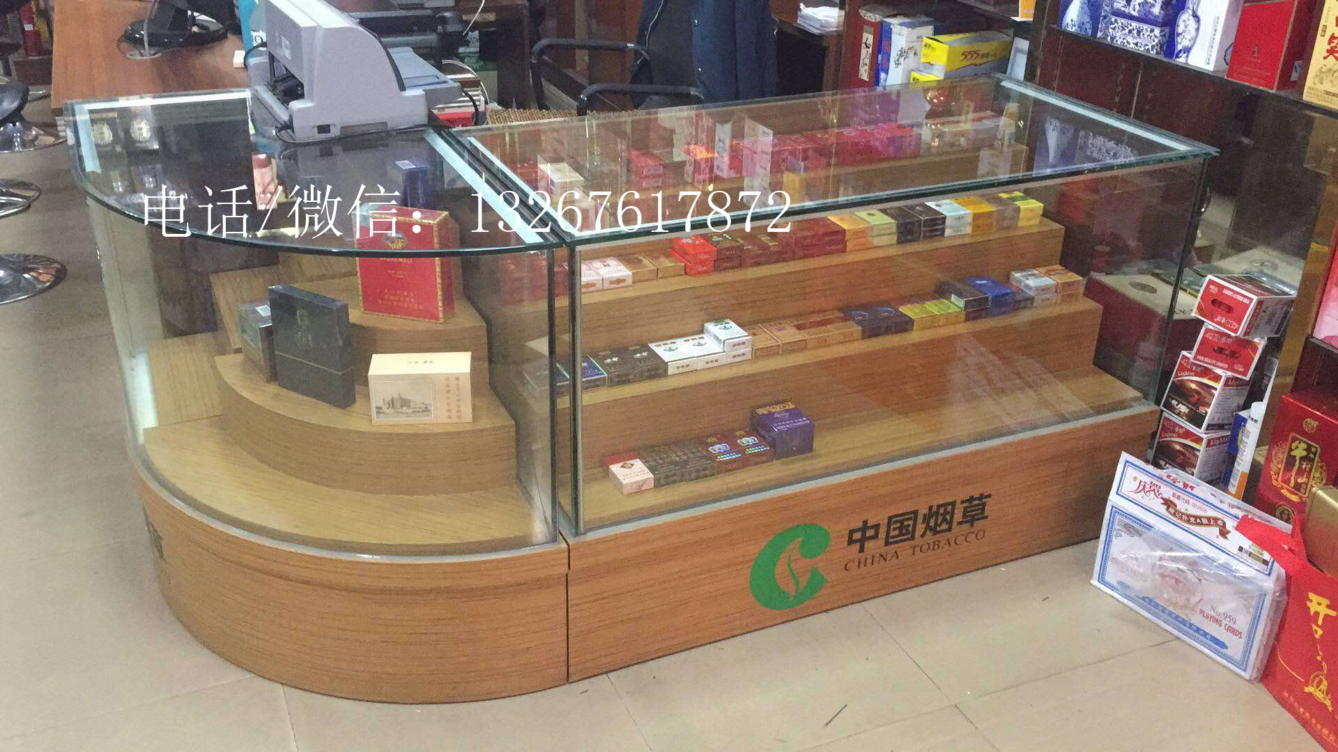 广东麻章区超市小卖店柜设计图