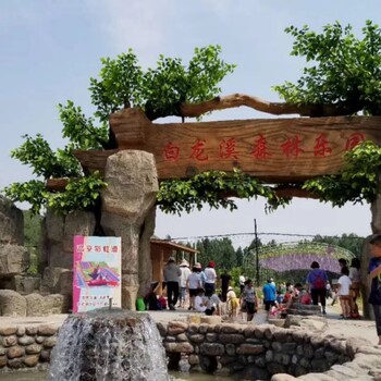 天津假樹(shù)大門(mén)圖片-天津生態(tài)園大門(mén)施工-天津古樹(shù)大門(mén)效果圖