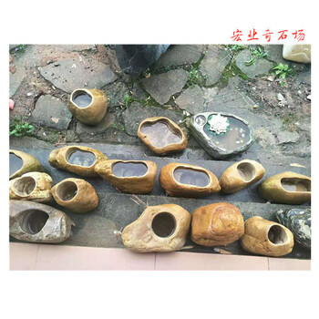 黃蠟石花盆圖片現(xiàn)貨石頭花盆廣東景觀石廠家宏業(yè)奇石場8