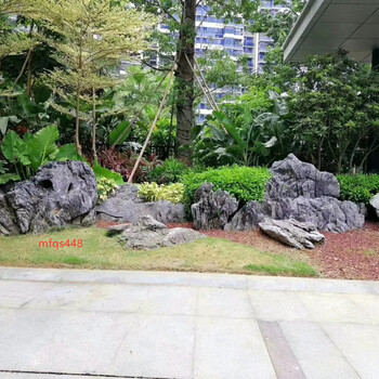 大英石草坪點(diǎn)綴案例大型英德石價(jià)格廣東假山石廠家8