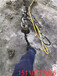 新疆库尔勒岩石矿山分裂石灰岩的机器设备开山机效果快