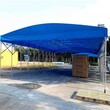 山东威海工厂电动伸缩雨蓬大型轨道仓库活动棚悬空电动推拉篷图片