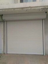 沈阳专业定做遥控车库门,沈阳电动卷帘门厂家图片