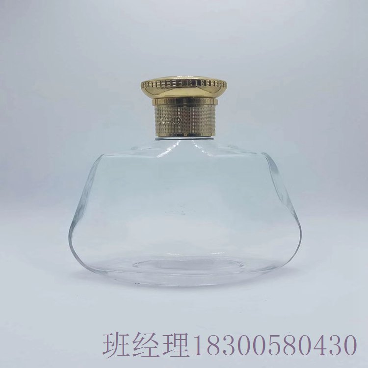湖北潜江玻璃酒瓶厂家设计生产各种透明果酒瓶