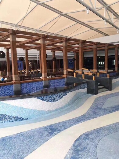 贵州遵义酒店泳池砾石聚合物仿沙滩地坪施工工艺