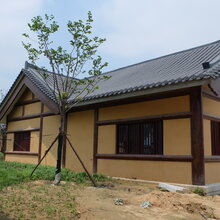 景区酒店复古建筑外墙稻草涂料图片